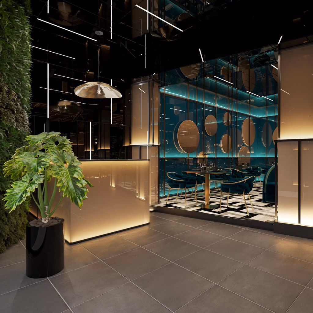 Modern restaurant interior with illuminated glass panels, circular mirrors on teal walls, velvet chairs, and a large potted plant.